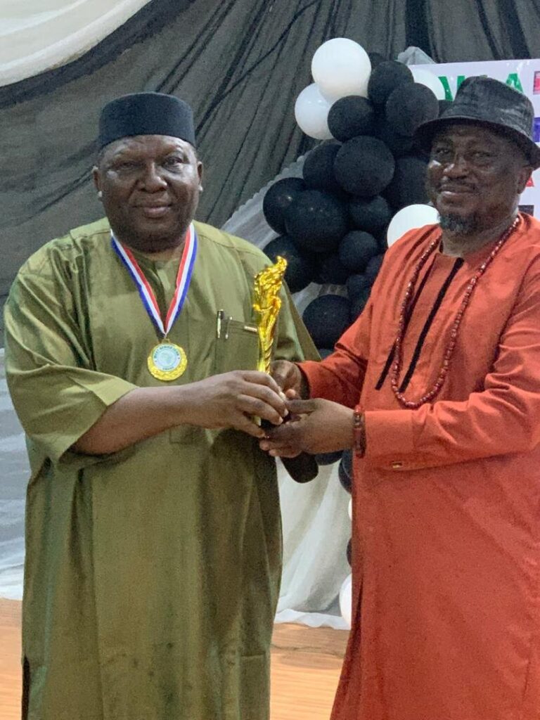 Paul-Ejime-receiving-an-award